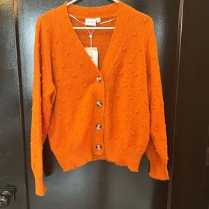 Orange cardigan, new with tags.